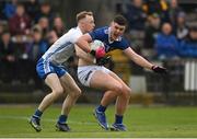 30 April 2022; Sean O'Connor of Tipperary in action against Michael Kiely of Waterford during the Munster GAA Senior Football Championship Quarter-Final match between Waterford and Tipperary at Fraher Field in Dungarvan, Waterford. Photo by Seb Daly/Sportsfile