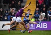 30 April 2022; Seán Bugler of Dublin in action against Glen Malone, 6, and Dylan Furlong of Wexford  during the Leinster GAA Football Senior Championship Quarter-Final match between Wexford and Dublin at Chadwicks Wexford Park in Wexford. Photo by Ray McManus/Sportsfile