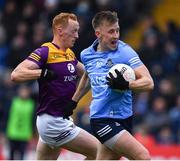 30 April 2022; Seán Bugler of Dublin in action against Alan Tobin of Wexford during the Leinster GAA Football Senior Championship Quarter-Final match between Wexford and Dublin at Chadwicks Wexford Park in Wexford. Photo by Ray McManus/Sportsfile