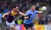 30 April 2022; John Small of Dublin in action against Robbie Brooks of Wexford during the Leinster GAA Football Senior Championship Quarter-Final match between Wexford and Dublin at Chadwicks Wexford Park in Wexford. Photo by Ray McManus/Sportsfile