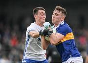 30 April 2022; Jack Harney of Tipperary in action against Stephen Curry of Waterford during the Munster GAA Senior Football Championship Quarter-Final match between Waterford and Tipperary at Fraher Field in Dungarvan, Waterford. Photo by Seb Daly/Sportsfile
