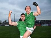 30 April 2022; Limerick players Josh Ryan, left, and Peter Nash celebrate after their side's victory in the penalty shoot-out of the Munster GAA Senior Football Championship Quarter-Final match between Clare and Limerick at Cusack Park in Ennis, Clare. Photo by Piaras Ó Mídheach/Sportsfile