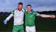 30 April 2022; Limerick players Donal O Sullivan, left, and Iain Corbett celebrate after their side's victory in the penalty shoot-out of the Munster GAA Senior Football Championship Quarter-Final match between Clare and Limerick at Cusack Park in Ennis, Clare. Photo by Piaras Ó Mídheach/Sportsfile