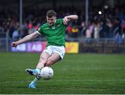 30 April 2022; James Naughton of Limerick shoots to score the winning penalty in the penalty shoot-out of the Munster GAA Senior Football Championship Quarter-Final match between Clare and Limerick at Cusack Park in Ennis, Clare. Photo by Piaras Ó Mídheach/Sportsfile