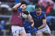 30 April 2022; Nigel Harte of Westmeath is tackled by Kevin Diffley of Longford during the Leinster GAA Football Senior Championship Quarter-Final match between Westmeath and Longford at TEG Cusack Park in Mullingar, Westmeath. Photo by Ben McShane/Sportsfile