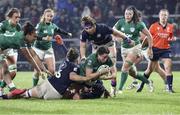 30 April 2022; Hannah O'Connor of Ireland is tackled by Rachel Malcolm and Sarah Bonar of Scotland during the Tik Tok Women's Six Nations Rugby Championship match between Ireland and Scotland at Kingspan Stadium in Belfast. Photo by John Dickson/Sportsfile