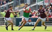 24 April 2022; Aidan O’Shea of Mayo in action against Matthew Tierney, left, and Paul Conroy of Galway during the Connacht GAA Football Senior Championship Quarter-Final match between Mayo and Galway at Hastings Insurance MacHale Park in Castlebar, Mayo. Photo by Brendan Moran/Sportsfile