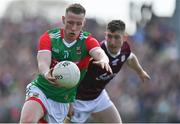 24 April 2022; Ryan O’Donoghue of Mayo in action against Johnny Heaney of Galway during the Connacht GAA Football Senior Championship Quarter-Final match between Mayo and Galway at Hastings Insurance MacHale Park in Castlebar, Mayo. Photo by Brendan Moran/Sportsfile
