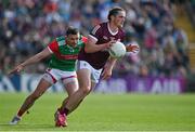 24 April 2022; Kieran Molloy of Galway in action against Jason Doherty of Mayo during the Connacht GAA Football Senior Championship Quarter-Final match between Mayo and Galway at Hastings Insurance MacHale Park in Castlebar, Mayo. Photo by Brendan Moran/Sportsfile