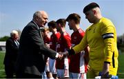 26 April 2022; FAI president Gerry McAnaney with Queen's University Belfast goalkeeper Conan Doherty before the Collingwood Cup Final match between UCD and Queens University Belfast at Oriel Park in Dundalk, Louth. Photo by Ben McShane/Sportsfile