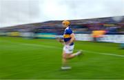 17 April 2022; Tipperary captain Ronan Maher runs onto the pithc before the Munster GAA Hurling Senior Championship Round 1 match between Waterford and Tipperary at Walsh Park in Waterford. Photo by Brendan Moran/Sportsfile