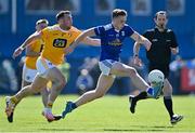 23 April 2022; Cormac O'Reilly of Cavan in action against Conor Murray of Antrim during the Ulster GAA Football Senior Championship Quarter-Final match between Antrim and Cavan at Corrigan Park in Belfast. Photo by Ramsey Cardy/Sportsfile