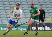 27 April 2022; Eoin O'Brien of Waterford in action against John Kirby of Limerick during the oneills.com Munster GAA Hurling U20 Championship Semi-Final match between Limerick and Waterford at TUS Gaelic Grounds in Limerick, Ireland. Photo by Michael P Ryan/Sportsfile
