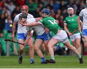27 April 2022; Mark Fitzgerald of Waterford in action against Eddie Stokes of Limerick during the oneills.com Munster GAA Hurling U20 Championship Semi-Final match between Limerick and Waterford at TUS Gaelic Grounds in Limerick, Ireland. Photo by Michael P Ryan/Sportsfile