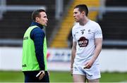 28 April 2022; Kildare manager Brian Flanagan, left, with Luke Killian of Kildare before the EirGrid Leinster GAA Football U20 Championship Final match between Dublin and Kildare at MW Hire O'Moore Park in Portlaoise, Laois. Photo by Ben McShane/Sportsfile