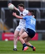 28 April 2022; James McGrath of Kildare and Fionn Murray of Dublin during the EirGrid Leinster GAA Football U20 Championship Final match between Dublin and Kildare at MW Hire O'Moore Park in Portlaoise, Laois. Photo by Ben McShane/Sportsfile