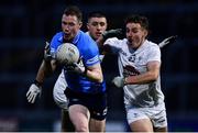 28 April 2022; Senan Forker of Dublin and Adam Conneely of Kildare during the EirGrid Leinster GAA Football U20 Championship Final match between Dublin and Kildare at MW Hire O'Moore Park in Portlaoise, Laois. Photo by Ben McShane/Sportsfile