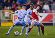 29 April 2022; Billy King of St Patrick's Athletic in action against Ronan Boyce, behind, and Brandon Kavanagh of Derry City during the SSE Airtricity League Premier Division match between St Patrick's Athletic and Derry City at Richmond Park in Dublin. Photo by Seb Daly/Sportsfile