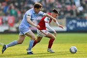 29 April 2022; Darragh Burns of St Patrick's Athletic in action against Cameron McJannet of Derry City during the SSE Airtricity League Premier Division match between St Patrick's Athletic and Derry City at Richmond Park in Dublin. Photo by Seb Daly/Sportsfile