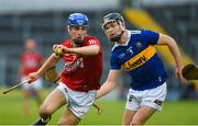 27 April 2022; Sean Walsh of Cork in action against Conor O'Dwyer of Tipperary during the oneills.com Munster GAA Hurling U20 Championship semi-final match between Tipperary and Cork at FBD Semple Stadium in Thurles, Tipperary. Photo by Diarmuid Greene/Sportsfile