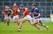 27 April 2022; Sean Walsh of Cork in action against Eddie Ryan of Tipperary during the oneills.com Munster GAA Hurling U20 Championship semi-final match between Tipperary and Cork at FBD Semple Stadium in Thurles, Tipperary. Photo by Diarmuid Greene/Sportsfile