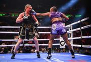 30 April 2022; Franchon Crews Dezurn, right, and Elin Cederroos during their undisputed super middleweight championship fight at Madison Square Garden in New York, USA. Photo by Stephen McCarthy/Sportsfile