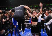 30 April 2022; Katie Taylor and coach Ross Enamait, left, celebrate victory after her undisputed world lightweight championship fight with Amanda Serrano at Madison Square Garden in New York, USA. Photo by Stephen McCarthy/Sportsfile