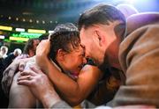 30 April 2022; Katie Taylor celebrates with her brothers Lee and Peter after her undisputed world lightweight championship fight victory over Amanda Serrano at Madison Square Garden in New York, USA. Photo by Stephen McCarthy/Sportsfile