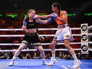 30 April 2022; Katie Taylor, left, and Amanda Serrano during their undisputed world lightweight championship fight at Madison Square Garden in New York, USA. Photo by Stephen McCarthy/Sportsfile