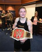 30 April 2022; Katie Taylor, holding a WWE belt, after her undisputed world lightweight championship fight with Amanda Serrano at Madison Square Garden in New York, USA. Photo by Stephen McCarthy/Sportsfile