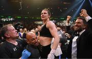 30 April 2022; Katie Taylor celebrates her undisputed world lightweight championship fight victory over Amanda Serrano with, from left, manager Brian Peters, trainer Ross Enamait and promoter Eddie Hearn at Madison Square Garden in New York, USA. Photo by Stephen McCarthy/Sportsfile