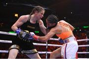 30 April 2022; Katie Taylor, left, and Amanda Serrano during their undisputed world lightweight championship fight at Madison Square Garden in New York, USA. Photo by Stephen McCarthy/Sportsfile