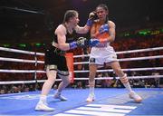 30 April 2022; Katie Taylor, left, and Amanda Serrano during their undisputed world lightweight championship fight at Madison Square Garden in New York, USA. Photo by Stephen McCarthy/Sportsfile