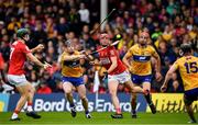 1 May 2022; Ciarán Joyce of Cork passes to Mark Coleman under pressure from Clare players, from left, Tony Kelly, Peter Duggan and Ian Glalvin during the Munster GAA Hurling Senior Championship Round 3 match between Cork and Clare at FBD Semple Stadium in Thurles, Tipperary. Photo by Ray McManus/Sportsfile