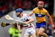 1 May 2022; Cork goalkeeper Patrick Collins is tackled by Peter Duggan of Clare during the Munster GAA Hurling Senior Championship Round 3 match between Cork and Clare at FBD Semple Stadium in Thurles, Tipperary. Photo by Ray McManus/Sportsfile