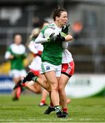 1 May 2022; Aisling O'Brien of Fermanagh in action against Nuala Browne of Derry during the Ulster Ladies Football Junior Championship Semi Final match between Derry and Fermanagh at O'Neills Healy Park in Omagh, Tyrone. Photo by David Fitzgerald/Sportsfile