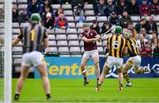 1 May 2022; Brian Concannon of Galway scores his side's 10th point, from a tight angle, despite the efforts of TJ Reid of Kilkenny during the Leinster GAA Hurling Senior Championship Round 3 match between Galway and Kilkenny at Pearse Stadium in Galway. Photo by Brendan Moran/Sportsfile