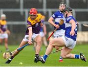 1 May 2022; Conor Hearne of Wexford in action against Liam O'Connell of Laois during the Leinster GAA Hurling Senior Championship Round 3 match between Laois and Wexford at MW Hire O’Moore Park in Portlaoise, Laois. Photo by Michael P Ryan/Sportsfile