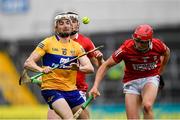 1 May 2022; Ryan Taylor of Clare is tackled by Shane Barrett and Ciarán Joyce, right, of Cork during the Munster GAA Hurling Senior Championship Round 3 match between Cork and Clare at FBD Semple Stadium in Thurles, Tipperary. Photo by Ray McManus/Sportsfile