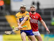 1 May 2022; Ryan Taylor of Clare is tackled by Shane Barrett of Cork during the Munster GAA Hurling Senior Championship Round 3 match between Cork and Clare at FBD Semple Stadium in Thurles, Tipperary. Photo by Ray McManus/Sportsfile