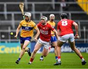 1 May 2022; Ryan Taylor of Clare is tackled by Shane Barrett and Darragh Fitzgibbon, 8, of Cork during the Munster GAA Hurling Senior Championship Round 3 match between Cork and Clare at FBD Semple Stadium in Thurles, Tipperary. Photo by Ray McManus/Sportsfile