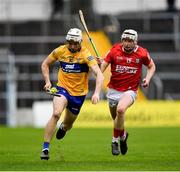 1 May 2022; Ryan Taylor of Clare is tackled by Shane Barrett of Cork during the Munster GAA Hurling Senior Championship Round 3 match between Cork and Clare at FBD Semple Stadium in Thurles, Tipperary. Photo by Ray McManus/Sportsfile