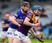 1 May 2022; Charlie McGuckin of Wexford in action against Liam O'Connell of Laois during the Leinster GAA Hurling Senior Championship Round 3 match between Laois and Wexford at MW Hire O’Moore Park in Portlaoise, Laois. Photo by Michael P Ryan/Sportsfile