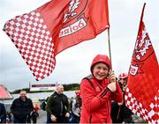 1 May 2022; Derry supporter Shan Dobbins, age 10, arrives before the Ulster GAA Football Senior Championship Quarter-Final match between Tyrone and Derry at O'Neills Healy Park in Omagh, Tyrone. Photo by David Fitzgerald/Sportsfile