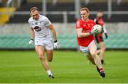 1 May 2022; Donal McKenny of Louth in action against Brian McLoughlin of Kildare during the Leinster GAA Football Senior Championship Quarter-Final match between Kildare and Louth at O'Connor Park in Tullamore, Offaly. Photo by Seb Daly/Sportsfile