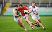 1 May 2022; Sam Mulroy of Louth in action against Ryan Houlihan, left, and Brian McLoughlin of Kildare during the Leinster GAA Football Senior Championship Quarter-Final match between Kildare and Louth at O'Connor Park in Tullamore, Offaly. Photo by Seb Daly/Sportsfile
