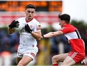 1 May 2022; Michael McKernan of Tyrone in action against Paul Cassidy of Derry during the Ulster GAA Football Senior Championship Quarter-Final match between Tyrone and Derry at O'Neills Healy Park in Omagh, Tyrone. Photo by David Fitzgerald/Sportsfile