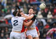 1 May 2022; Ciarán Byrne of Louth in action against Mick O’Grady, left, and Shea Ryan of Kildare during the Leinster GAA Football Senior Championship Quarter-Final match between Kildare and Louth at O'Connor Park in Tullamore, Offaly. Photo by Seb Daly/Sportsfile
