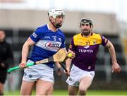 1 May 2022; Ryan Mullaney of Laois in action against Connal Flood of Wexford during the Leinster GAA Hurling Senior Championship Round 3 match between Laois and Wexford at MW Hire O’Moore Park in Portlaoise, Laois. Photo by Michael P Ryan/Sportsfile
