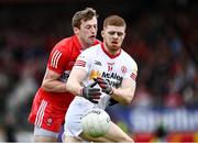 1 May 2022; Cathal McShane of Tyrone in action against Brendan Rogers of Derry during the Ulster GAA Football Senior Championship Quarter-Final match between Tyrone and Derry at O'Neills Healy Park in Omagh, Tyrone. Photo by David Fitzgerald/Sportsfile